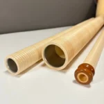 Hochwertige Holzmundstücke für Alphörner zeigen exquisite Handwerkskunst für NATURINSTRUMENTE Heimatklang.
