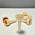 Hochwertige Holzmundstücke für Alphörner präsentieren handwerkliche Präzision und natürliche Akustik bei Heimatklang.